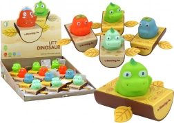 Nakręcana zabawka do wanny – dinozaur w łódce