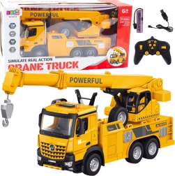 Miękka zabawka - żółty dźwig zdalnie sterowany