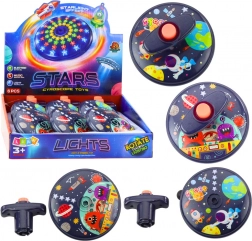 Świecący kosmiczny dysk z dźwiękiem – wirujący bączek UFO