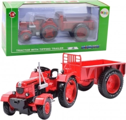 Metalowy czerwony traktor z przyczepą 1:18