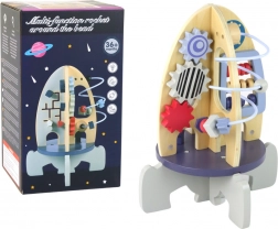 Drewniana edukacyjna rakieta z koralikowym labiryntem i kołami zębatymi