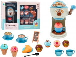 Słodkości kawiarniowe z maszynką do lodów, filiżankami i muffinami