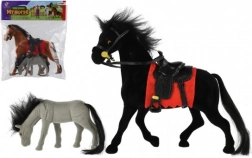 Zabawka koń z siodłem i źrebięciem