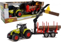 Traktor z leśną przyczepą i drewnem