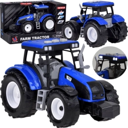 Niebieski traktor z napędem nakręcanym oraz efektami świetlnymi i dźwiękowymi