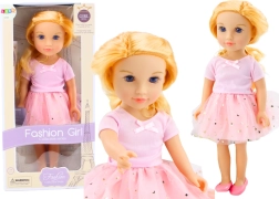 Lalka w różowej sukience z tiulową spódnicą i blond włosami