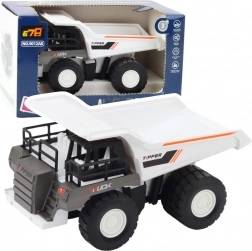 Wywrotka budowlana z metalowymi elementami i napędem biała