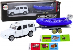 Samochód terenowy z przyczepą i łodzią motorową