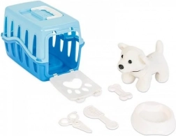 Piesek w niebieskim pudełku transportowym