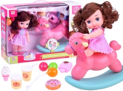 Lalka w różowej sukience w grochy z konikiem na biegunach i akcesoriami