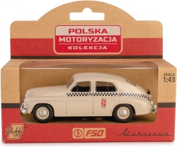 Historyczny pojazd PRL Warszawa M20 taxi model w kolorze piaskowym