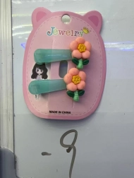 Spinka do włosów z pomarańczowym kwiatem