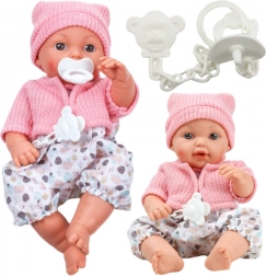 Tkaninowa lalka z czapką i dźwiękami