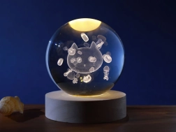 Kryształowa lampka kula kot 8 cm