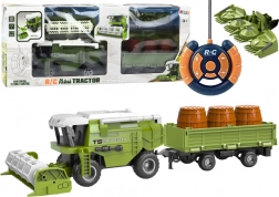 Zdalnie sterowany kombajn rolniczy z zieloną przyczepą