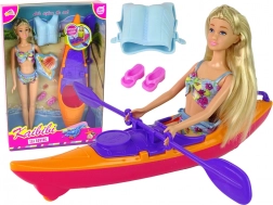 Zestaw lalka i pomarańczowy kajak z akcesoriami