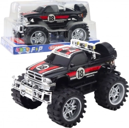 Samochód terenowy z napędem na tylne koła, duże koła, czerwono‑czarny