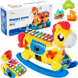 Koń na biegunach z sorterem i talerzykami