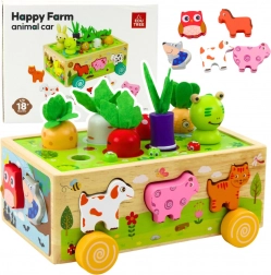 Drewniana edukacyjna farma na kółkach z sorterem i magnetycznymi robaczkami