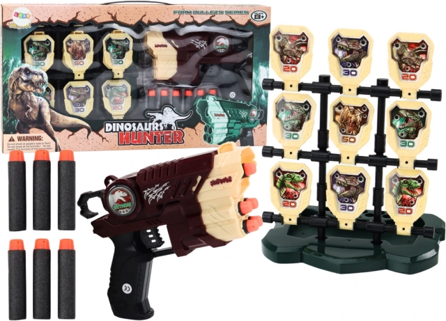 Zabawny pistolet z tarczą i piankowymi strzałkami – dinozaury