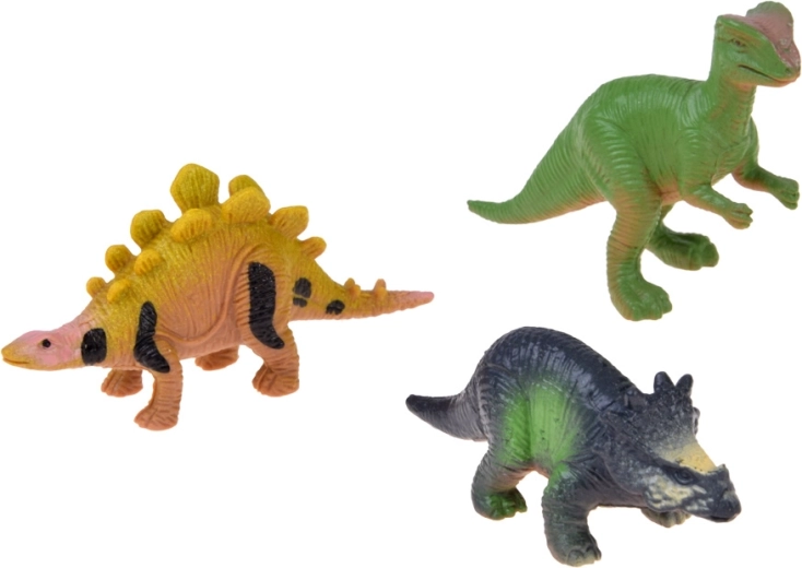 3 figurki dinozaurów i świecące naklejki