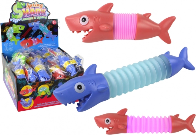 Antystresowa świecąca rozkładana zabawka rekin Pop Tube LED