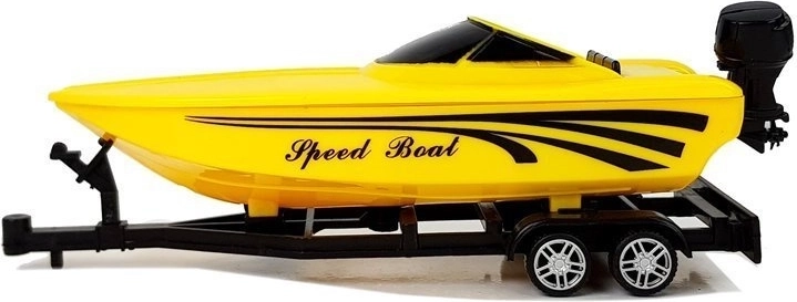 Odczepiana przyczepa z żółtą łodzią