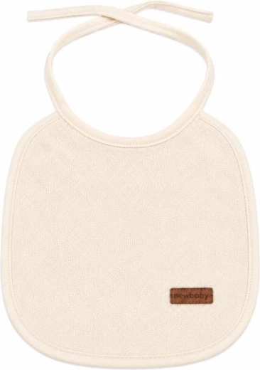 Dziecięcy śliniak frotte New Baby z podszewką PVC beżowy - 1 szt.