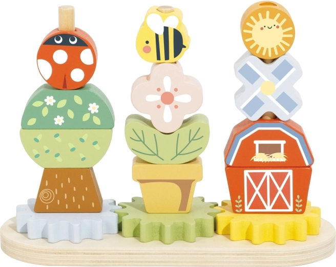 2Kids Toys drewniana układanka na paliki z ruchomymi kółkami zębatymi – wieś