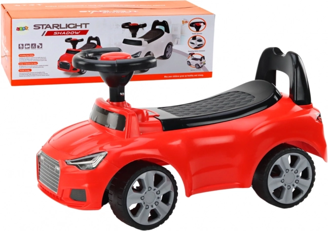 Jeździk z oparciem, klaksonem i schowkiem – czerwony