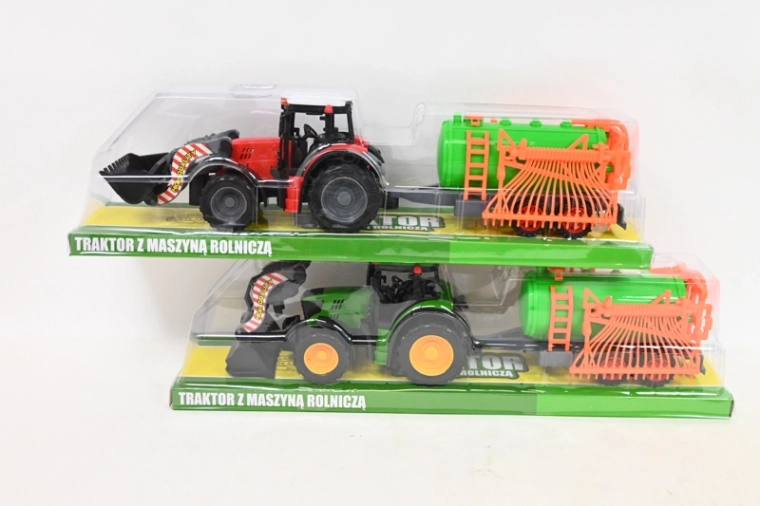 Traktor z ładowaczem czołowym i maszyną rolniczą