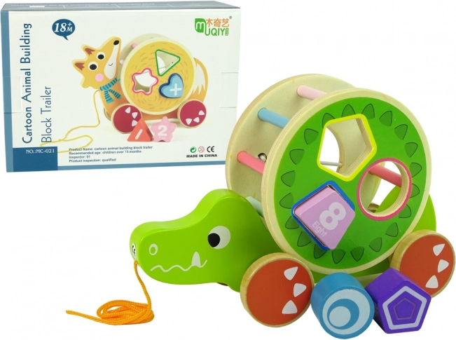 Drewniana zabawka do ciągnięcia krokodyl z sorterem