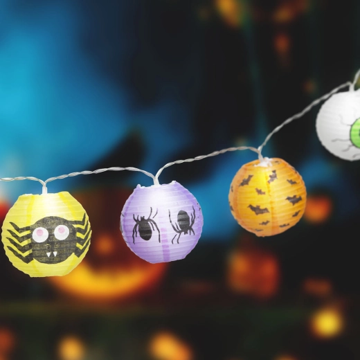 Halloweenowy łańcuch świetlny z lampionami w kształcie dyń