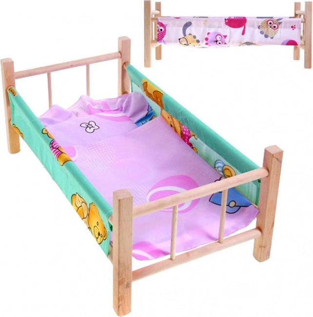 Drewniane łóżeczko dla lalek z pościelą