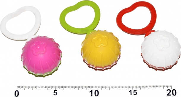 Grzechotka w kształcie kuli z motywem serca