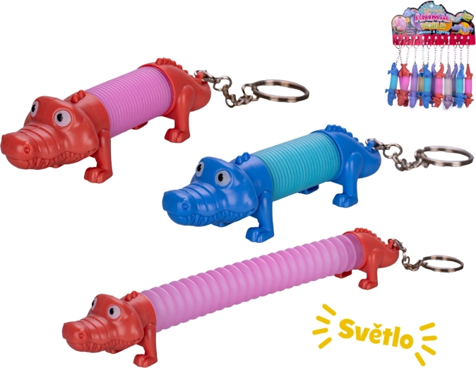 Nakręcana zawieszka do kluczy krokodyl ze światłem