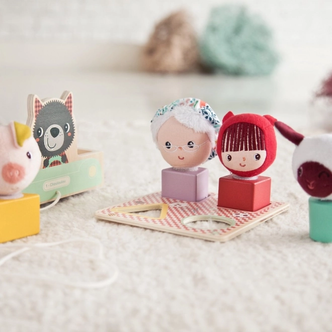 Wózek do ciągnięcia Lilliputiens wilk Ludwik z aktywnościami i sorterem kształtów