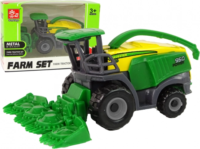 Zielona mała zabawkowa maszyna żniwna – kombajn