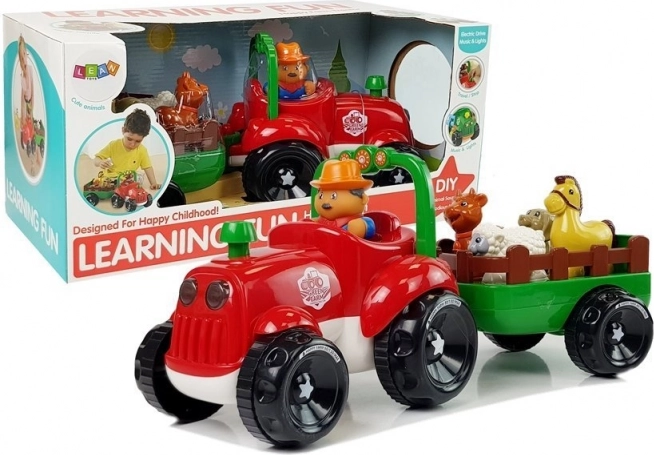 Muzyczny traktor z przyczepą i zwierzątkami na baterie