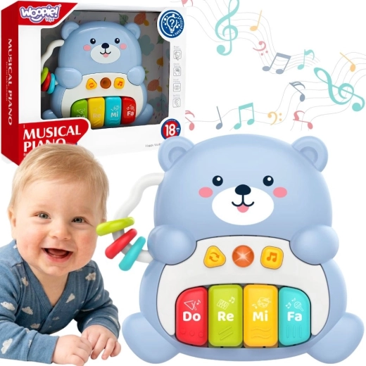 Woopie Baby interaktywny muzyczny pluszowy miś z pianinkiem