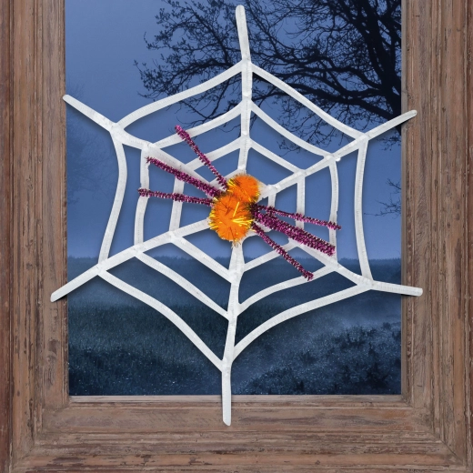 Biała halloweenowa pajęczyna z żółtym pająkiem