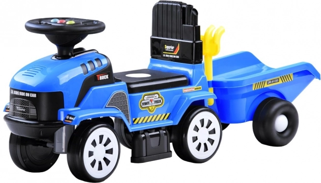 Jeździk traktor z przyczepą i melodiami dla dzieci – Traktor