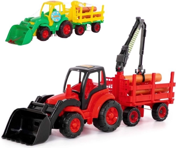 Traktor z łyżką czołową i leśną przyczepą