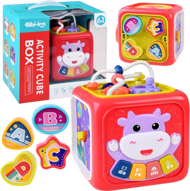 Interaktywna edukacyjna kostka z pianinkiem, labiryntem i sorterem