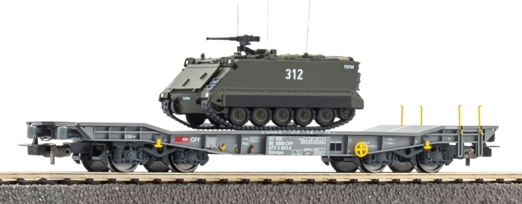 Piko ciężki wagon platforma Slmmnps z pojazdem opancerzonym M113 (SBB-CFF), H0