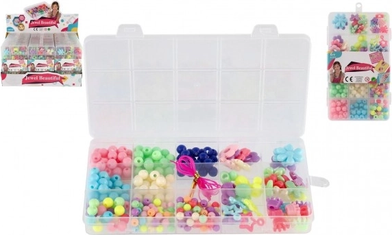 Zestaw kolorowych plastikowych koralików ze sznurkiem w praktycznym organizerze