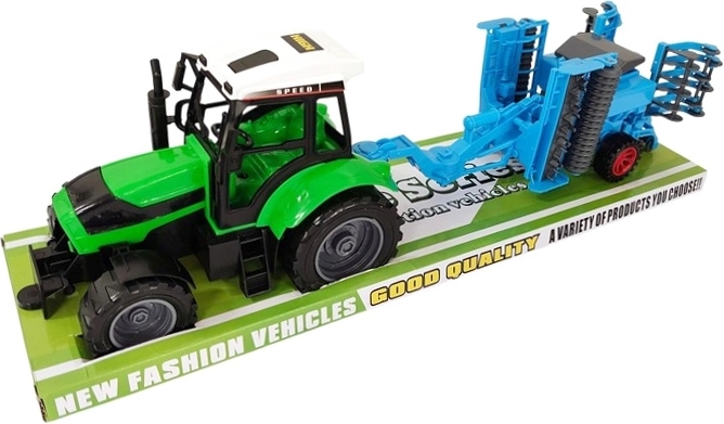 Dziecięcy traktor z doczepianą maszyną rolniczą