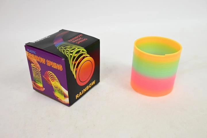 Tęczowa sprężyna slinky w pudełku