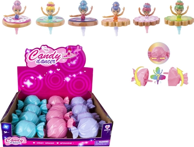 Lalka baletnica kręcąca się jak bączek w ozdobnym opakowaniu w kształcie cukierka