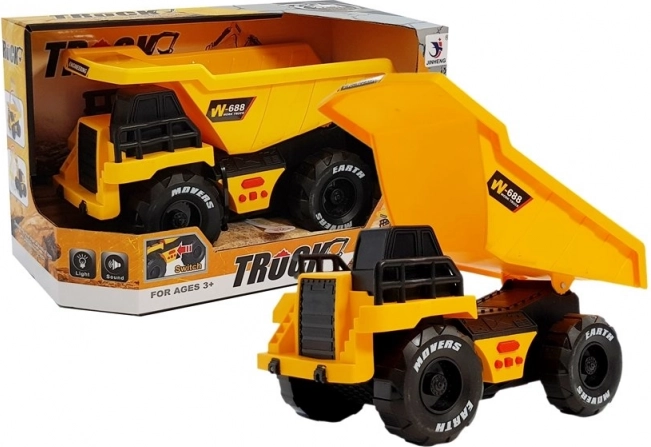 Żółta dziecięca wywrotka z napędem ciernym, światłami i dźwiękami